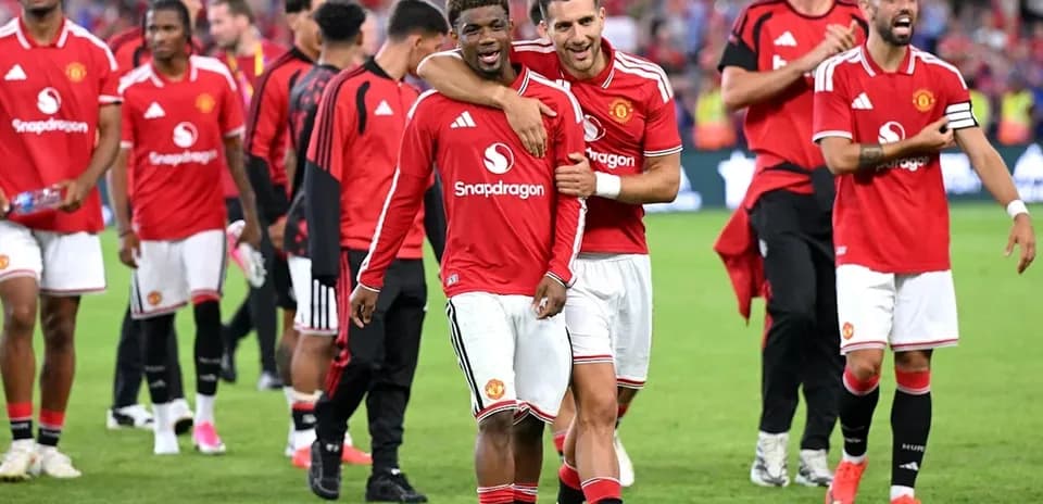 Manchester United players celebrating after a match