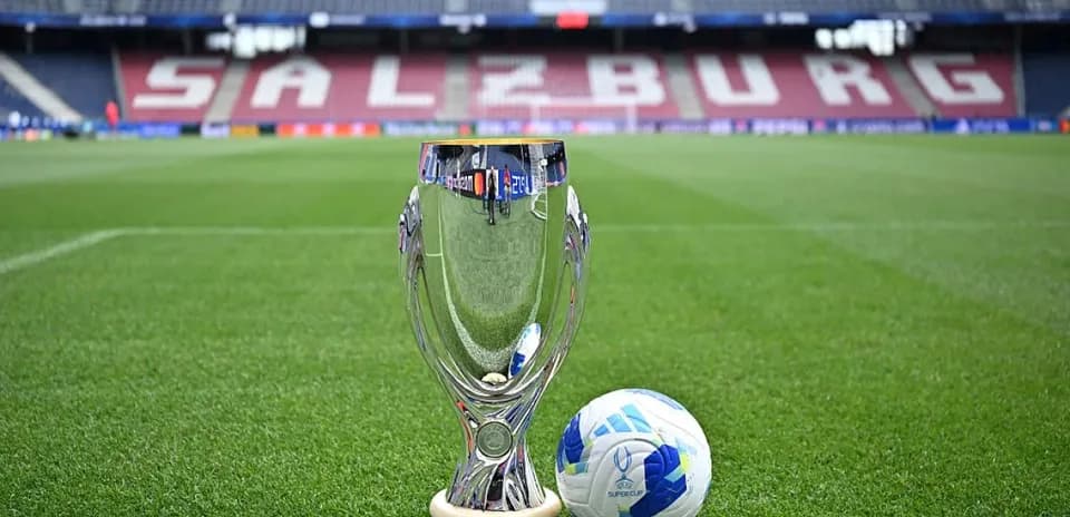 UEFA Super Cup trophy and ball on pitch