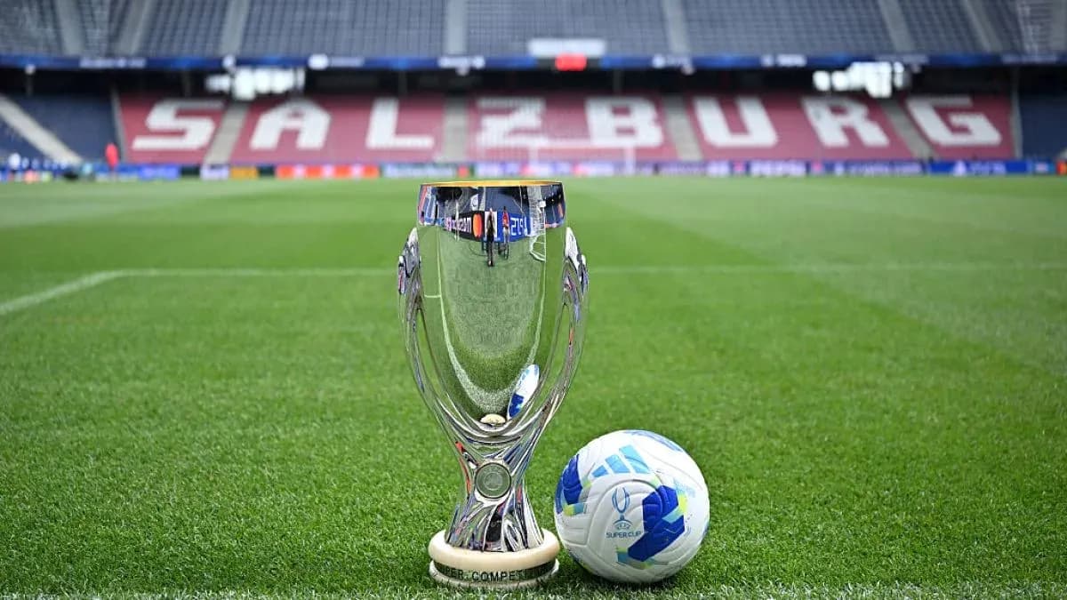 UEFA Super Cup trophy and ball on pitch