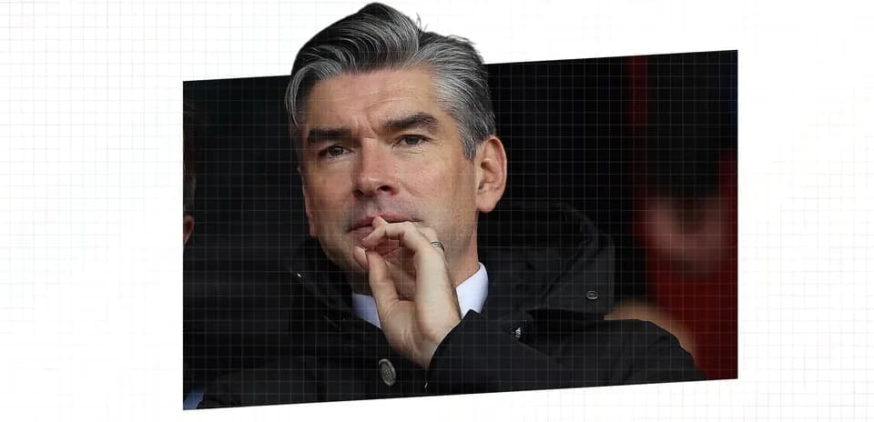 Man observing match from the stands