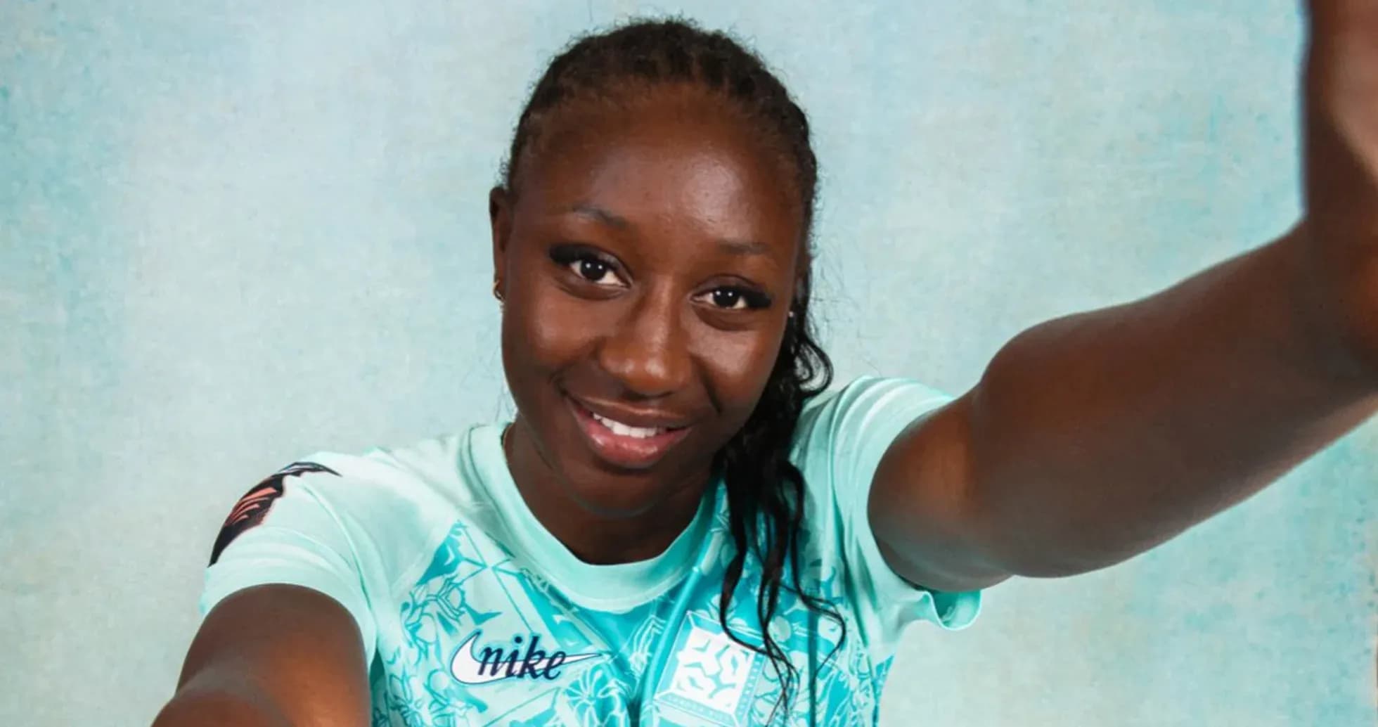 Athlete posing for a selfie in sports jersey