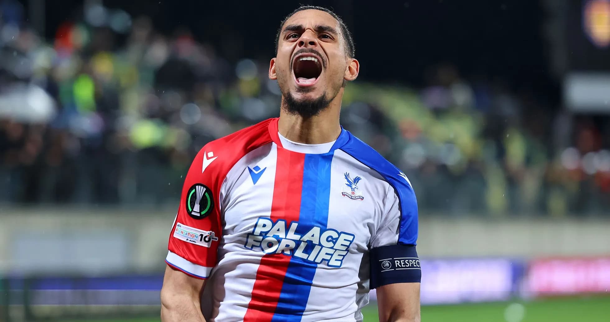 Player celebrating in Crystal Palace jersey during match