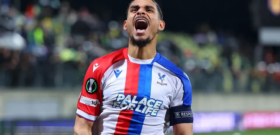 Player celebrating in Crystal Palace jersey during match