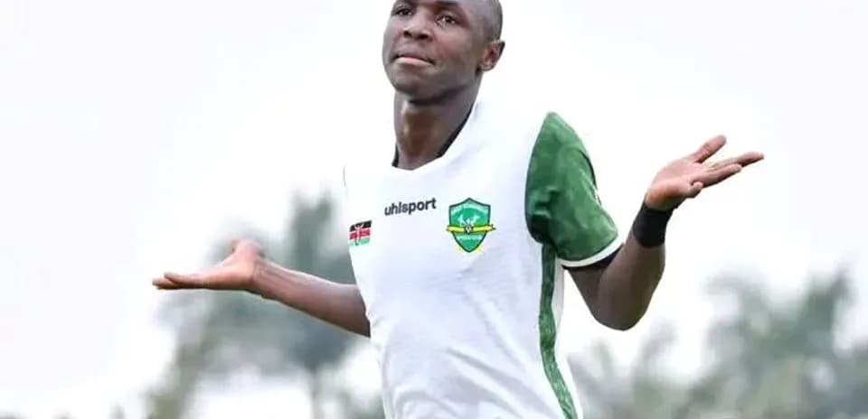 Player celebrating a goal with a shrug gesture