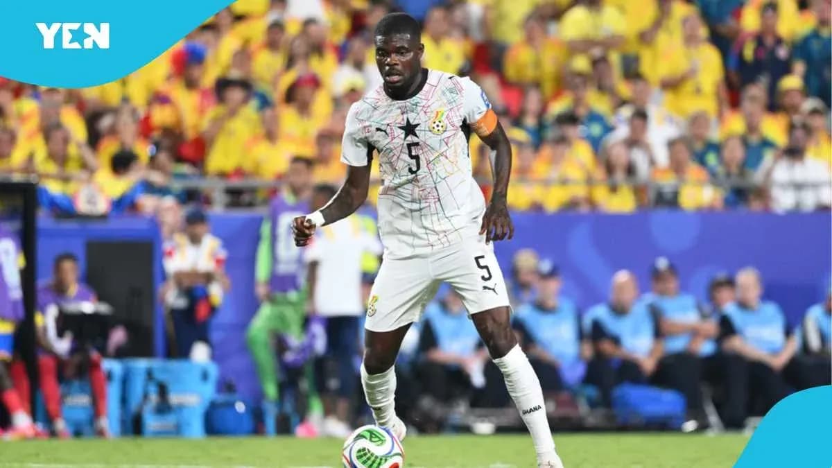 Ghana player dribbling the ball during a match