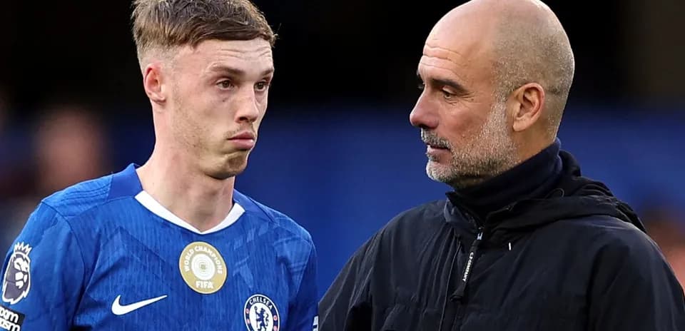 Player and manager discussing on the pitch
