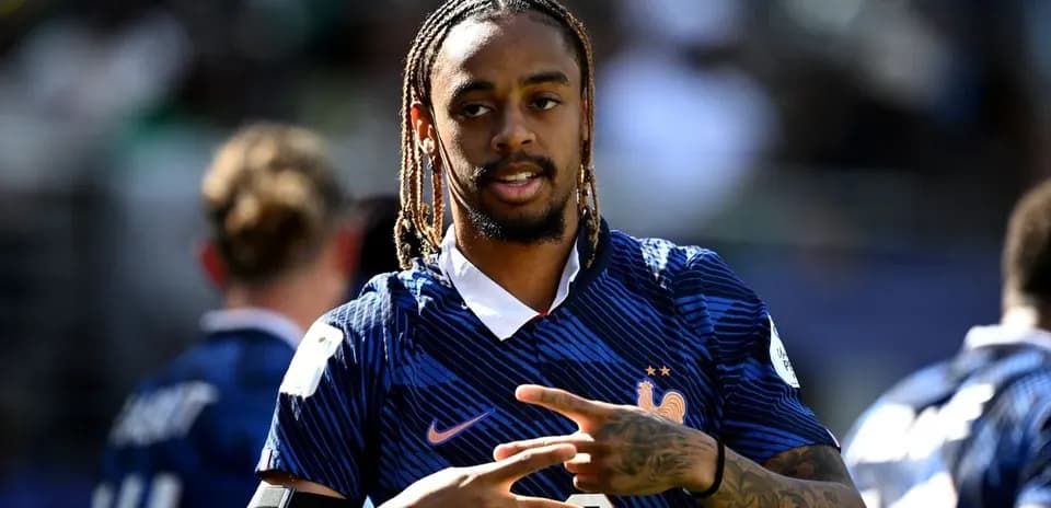 Player in France jersey posing during warm-up