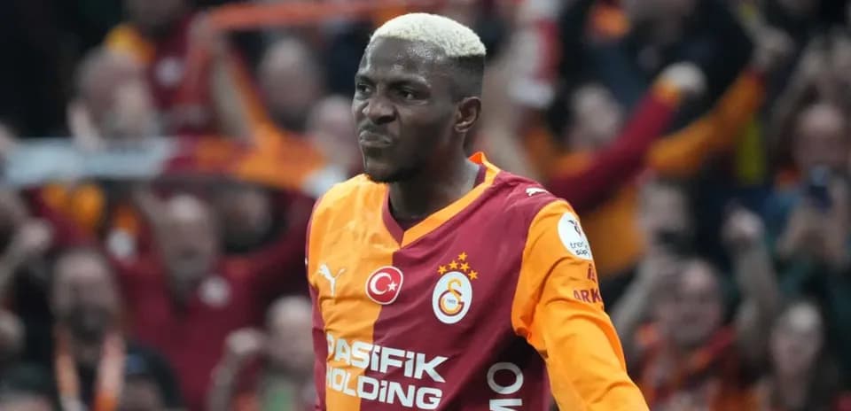Player celebrating in Galatasaray jersey at stadium