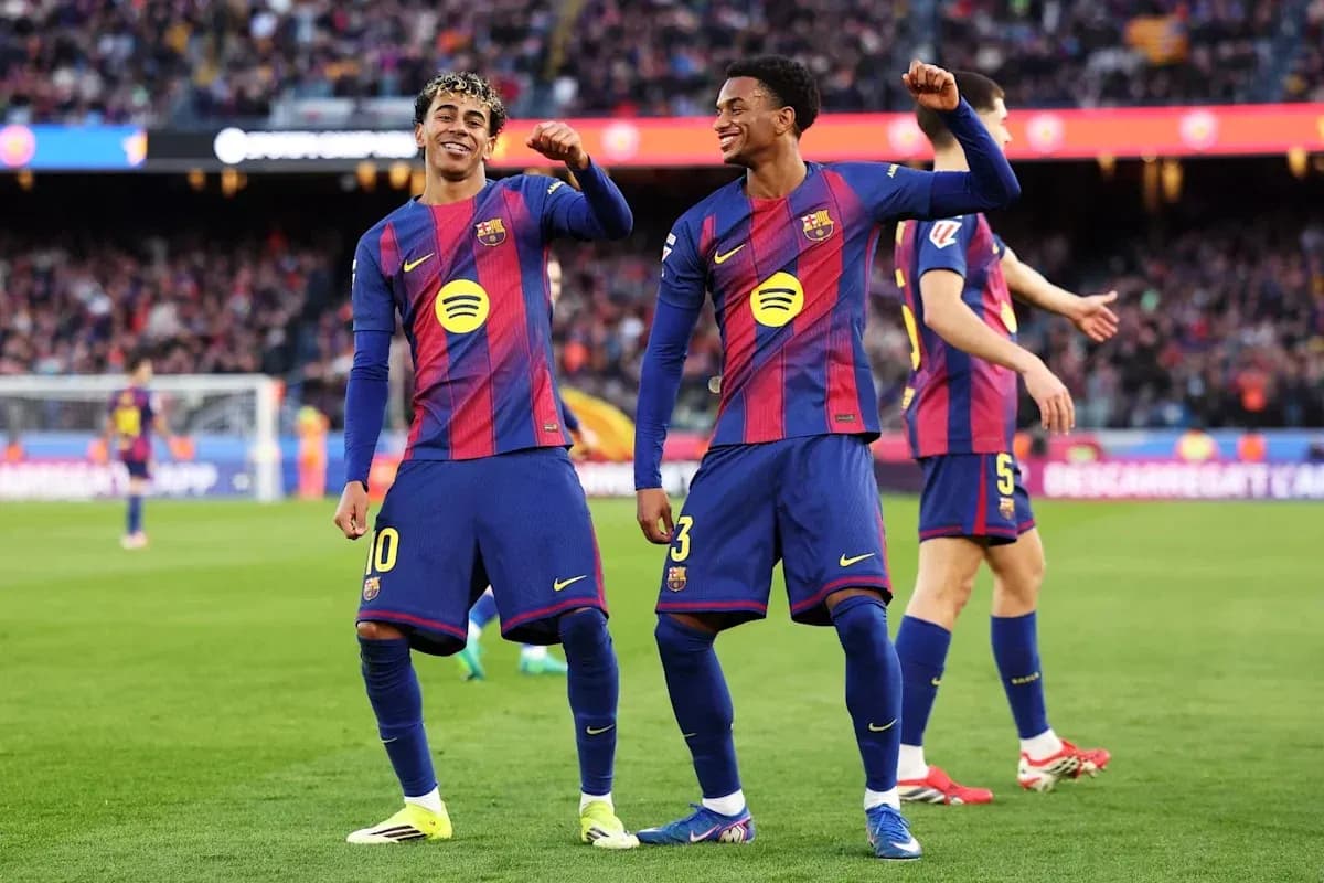 Barcelona players celebrating a goal on the pitch