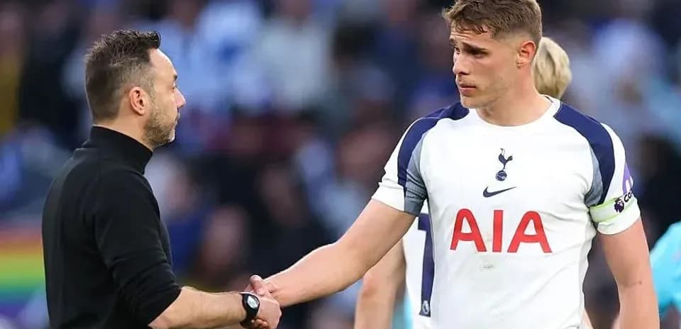 Manager shaking hands with player after match