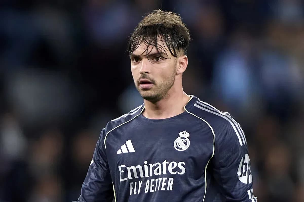 Goalkeeper wearing Real Madrid kit during match