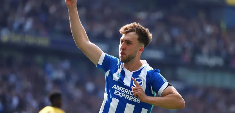 Player celebrating goal with raised finger during match
