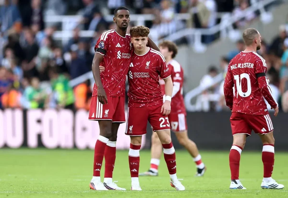 Liverpool players regrouping during a match