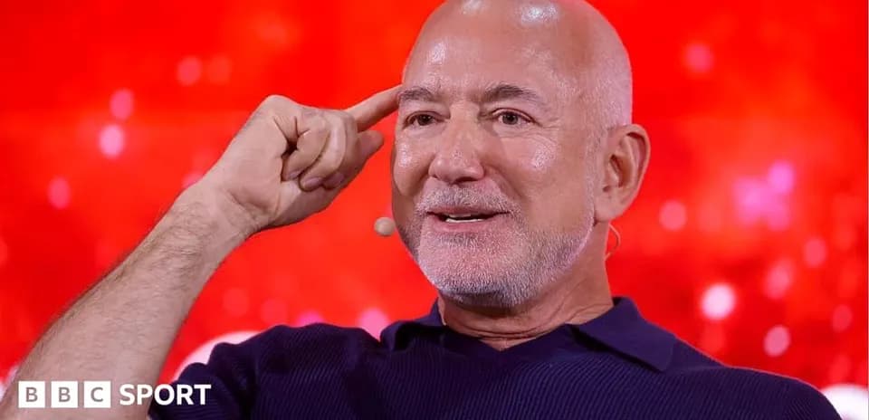 Person speaking with hand gesture during event