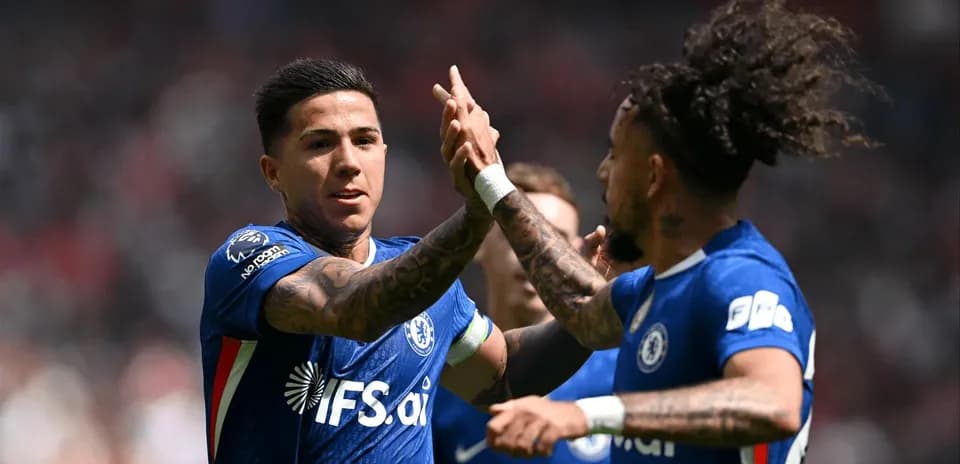 Chelsea players celebrating a goal during match