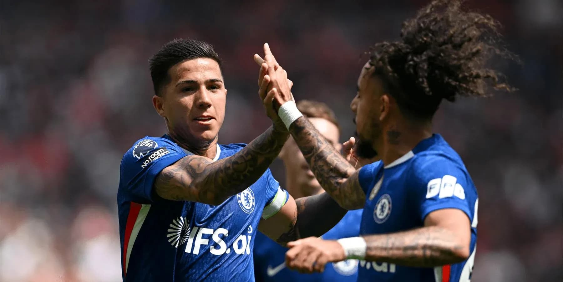 Chelsea players celebrating a goal during match