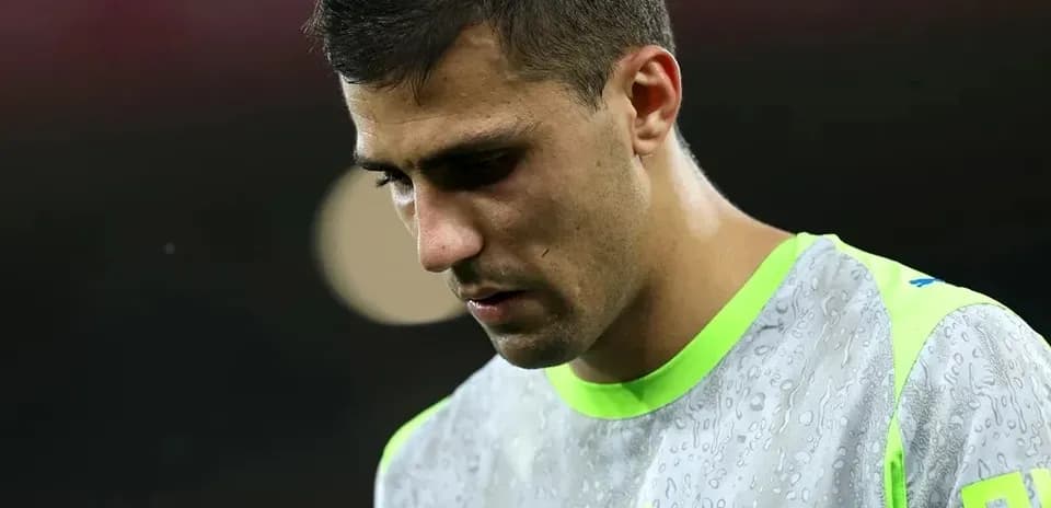 Player looking down while wearing training gear