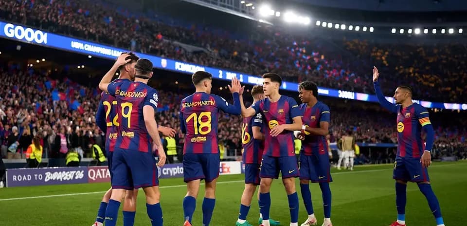 Barcelona players celebrating a goal at Camp Nou