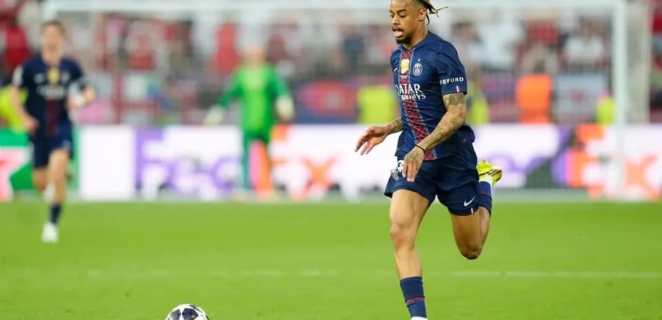 Player running with ball during UEFA Champions League match