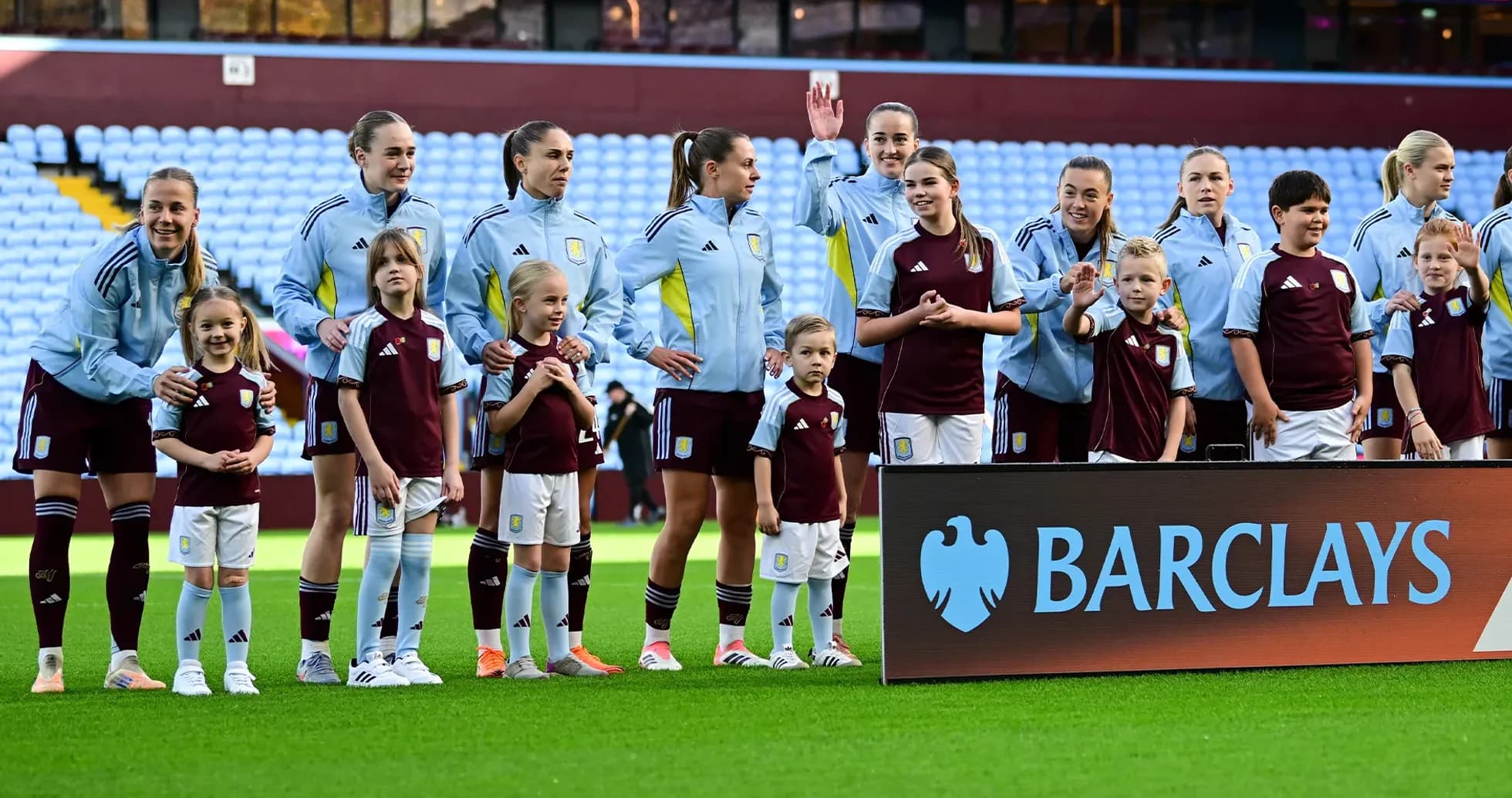 Aston Villa players with mascots before the match