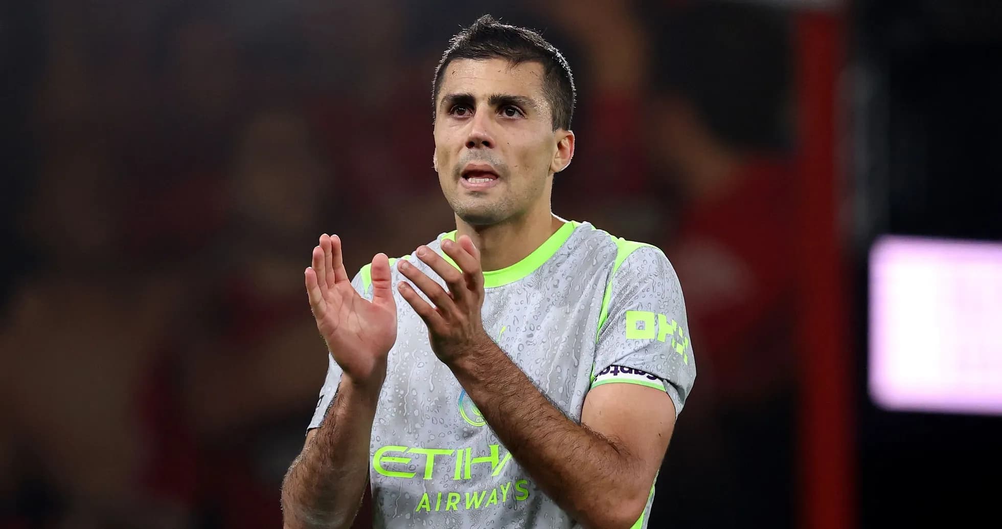 Player clapping in Manchester City jersey during match Player clapping in Manchester City jersey during match