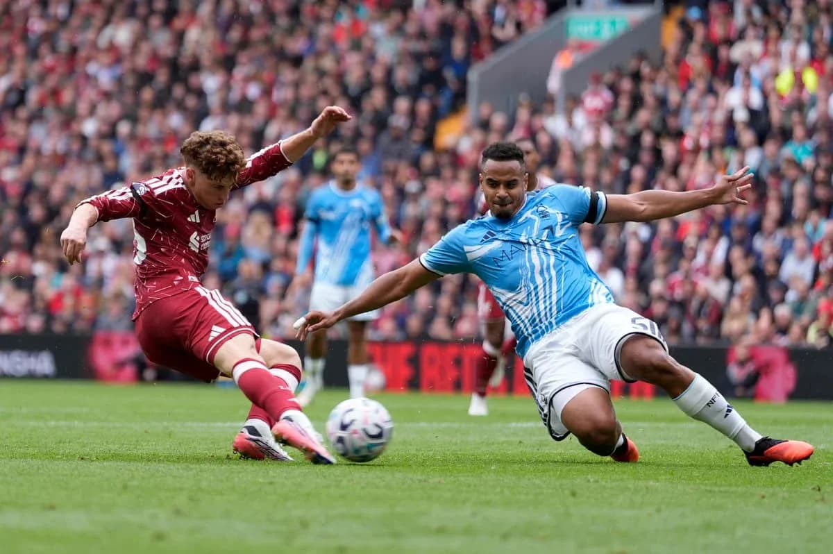 Player tackling opponent during football match Player tackling opponent during football match