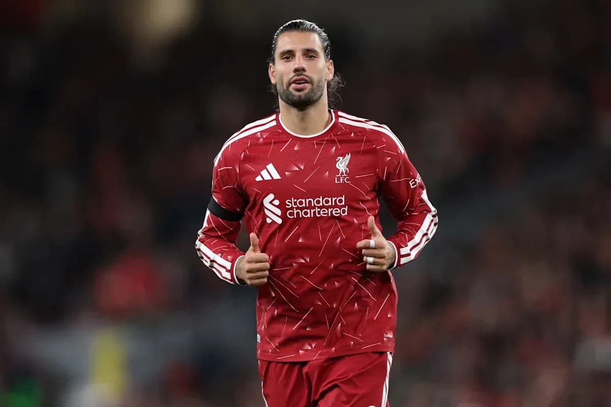 Player warming up in Liverpool FC training kit Player warming up in Liverpool FC training kit