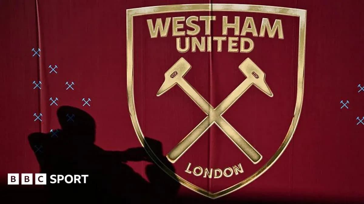 West Ham United logo on a maroon background West Ham United logo on a maroon background