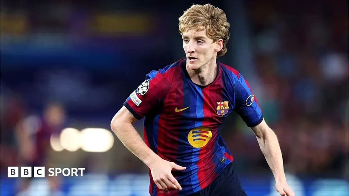 Player in FC Barcelona kit running on the pitch Player in FC Barcelona kit running on the pitch