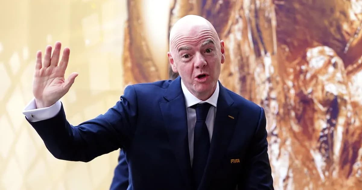 FIFA official gesturing during press event FIFA official gesturing during press event