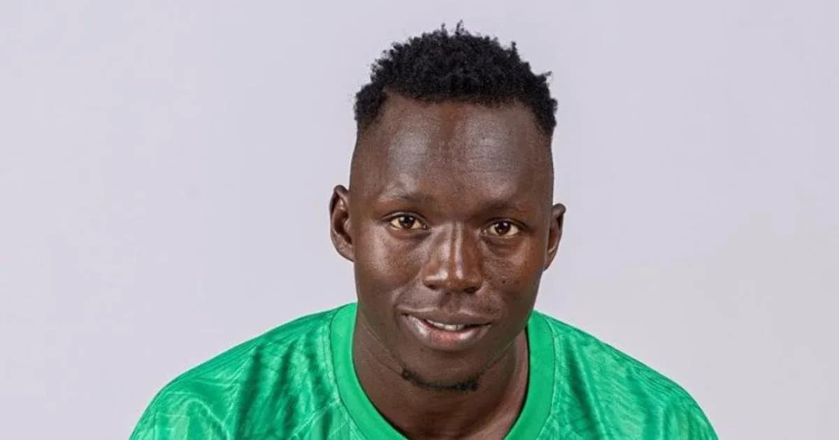 Player in green jersey smiling for portrait Player in green jersey smiling for portrait
