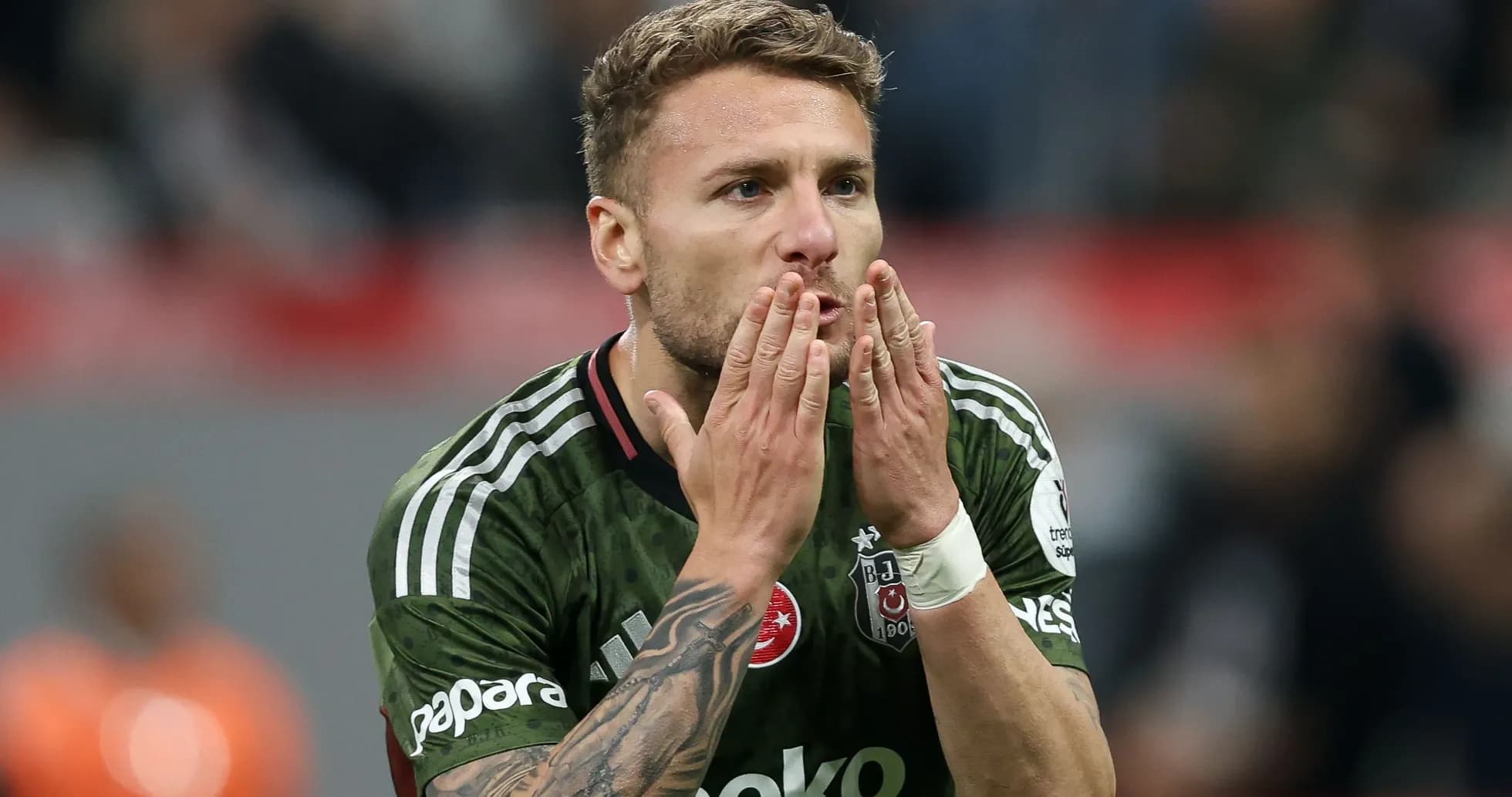 Player celebrating with hand gestures on field Player celebrating with hand gestures on field