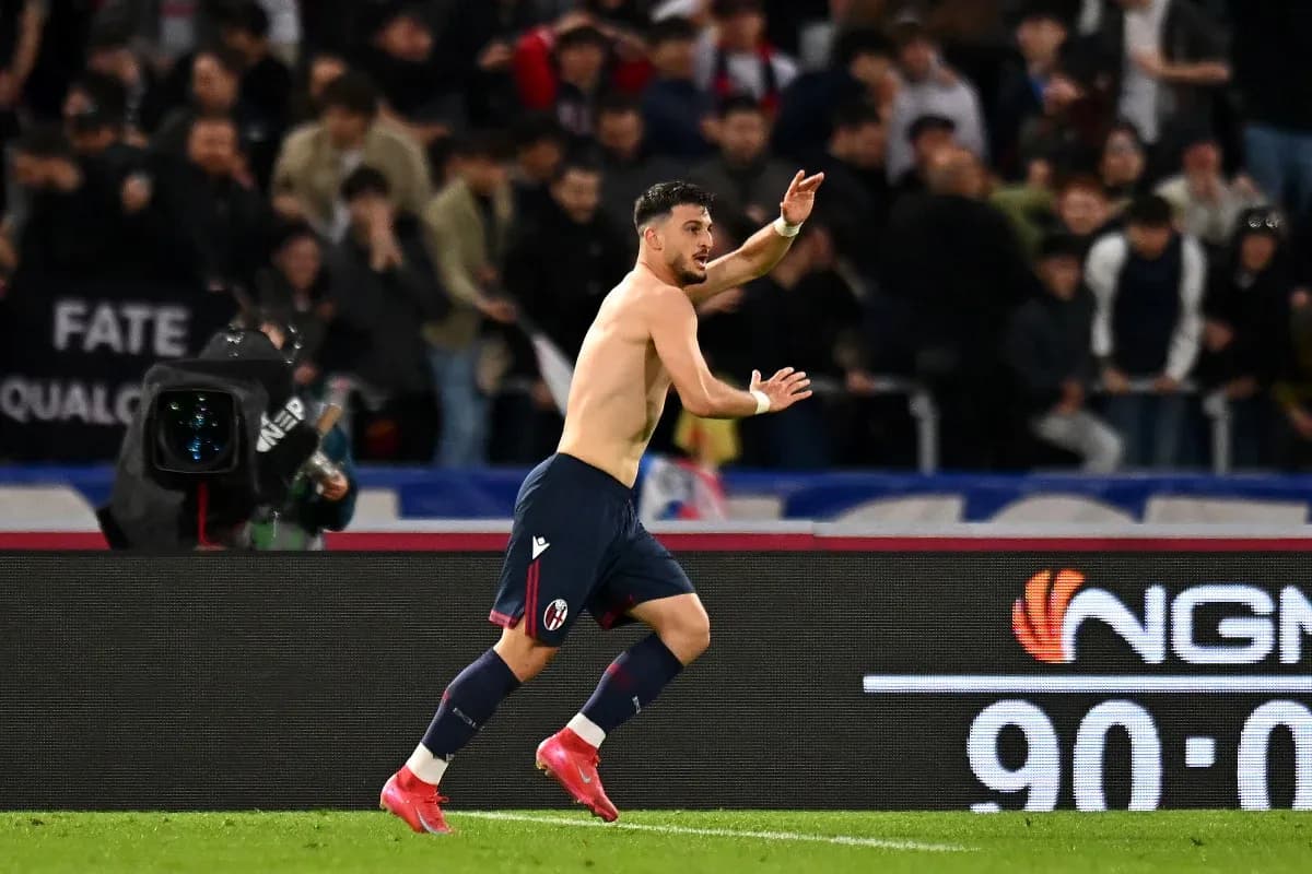 Bologna player celebrating after scoring a goal Bologna player celebrating after scoring a goal