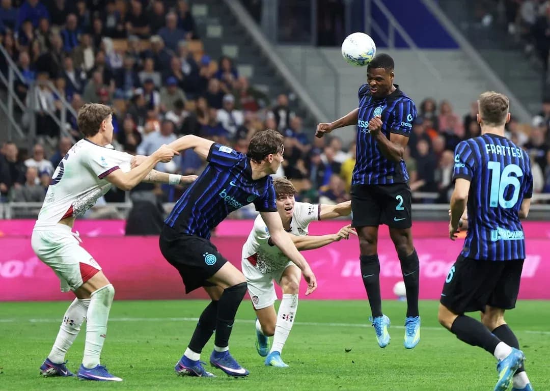 Inter player heading the ball during match Inter player heading the ball during match