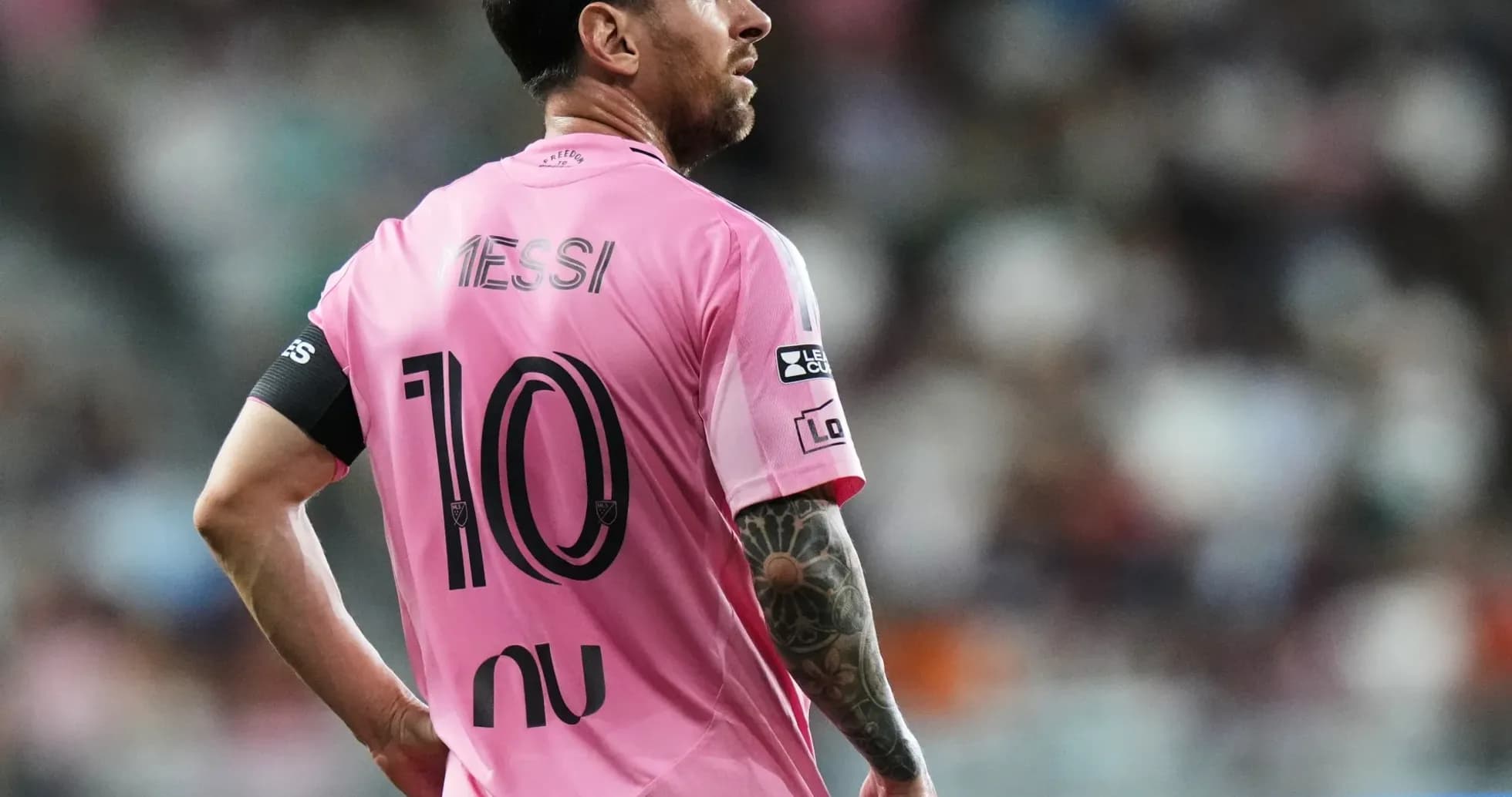 Player wearing pink jersey with number 10 Player wearing pink jersey with number 10