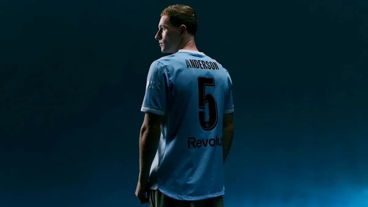 Player wearing light blue jersey with number 5 Player wearing light blue jersey with number 5