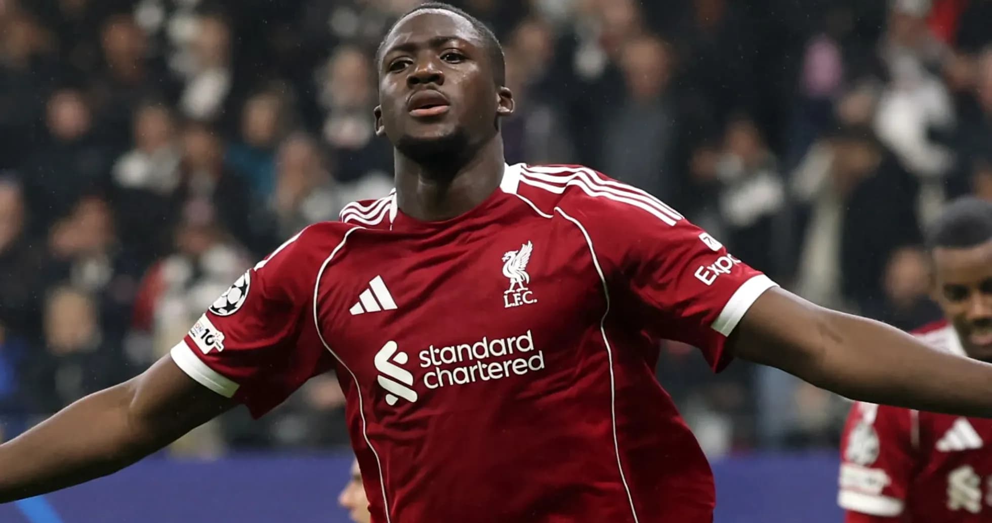 Liverpool player celebrating after scoring a goal Liverpool player celebrating after scoring a goal