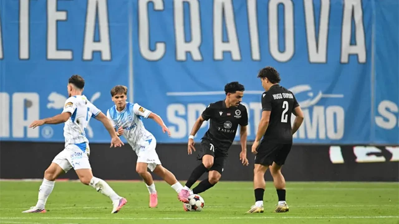 Universitatea Craiova players in action during match Universitatea Craiova players in action during match
