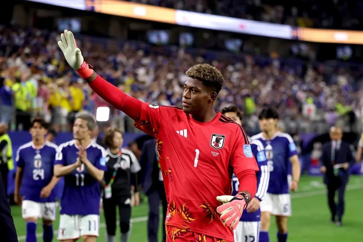 Japanese goalkeeper waving to fans after match Japanese goalkeeper waving to fans after match