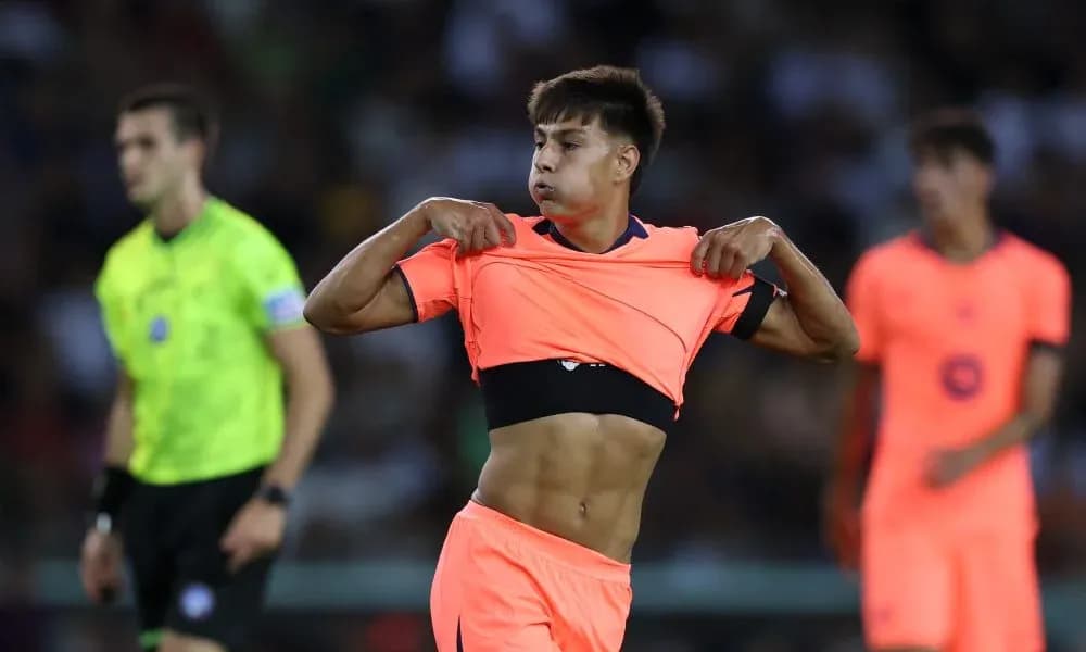 Player changing jersey during a football match Player changing jersey during a football match