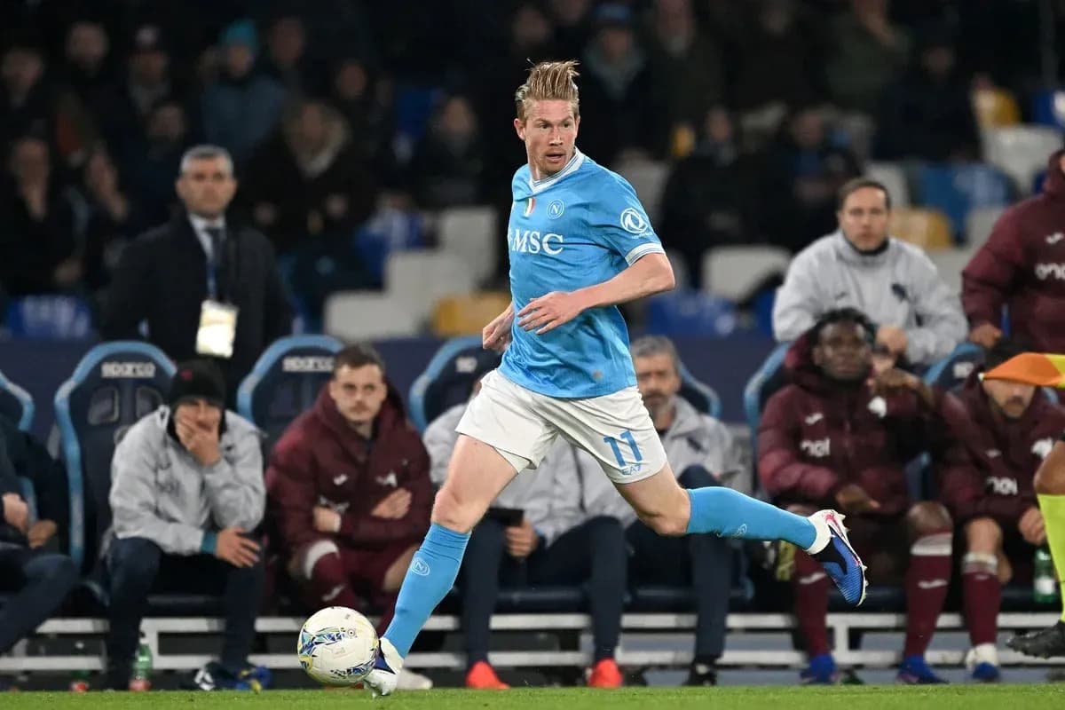 Player in blue jersey running with the ball Player in blue jersey running with the ball