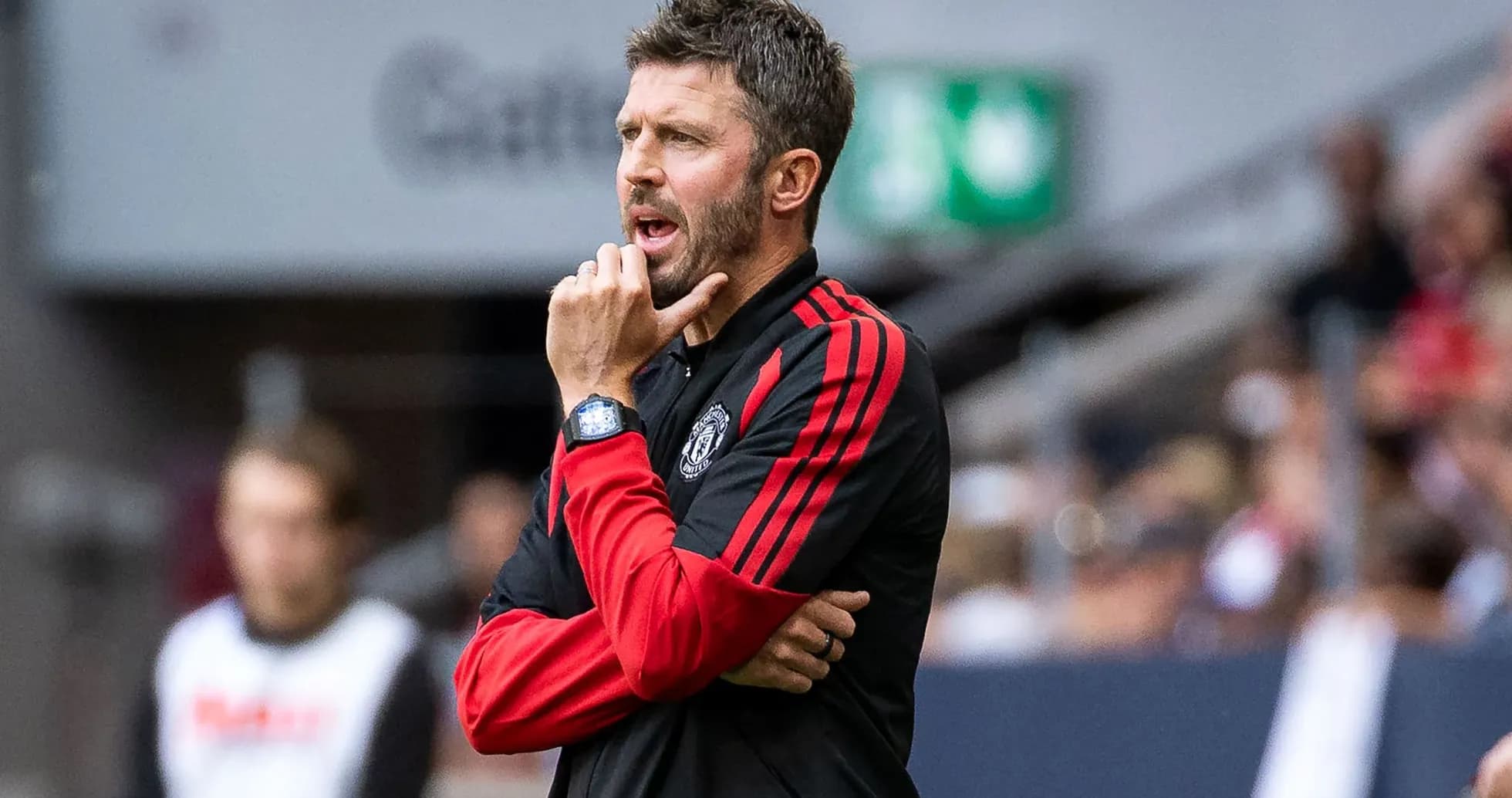 Coach gesturing during match on the sidelines Coach gesturing during match on the sidelines