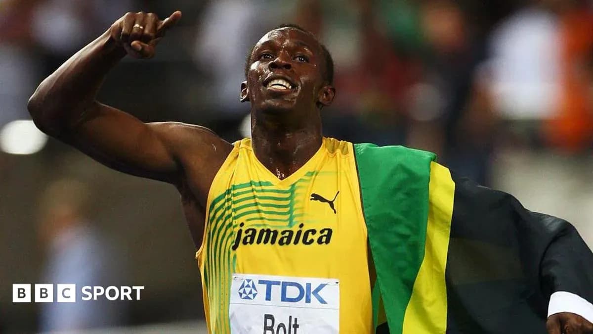 Athlete celebrating victory wearing Jamaican colors Athlete celebrating victory wearing Jamaican colors