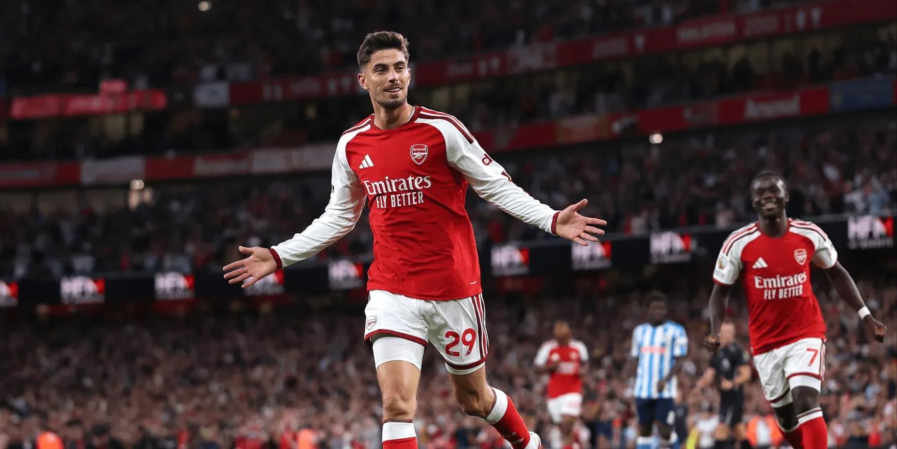 Arsenal player celebrating goal during match Arsenal player celebrating goal during match