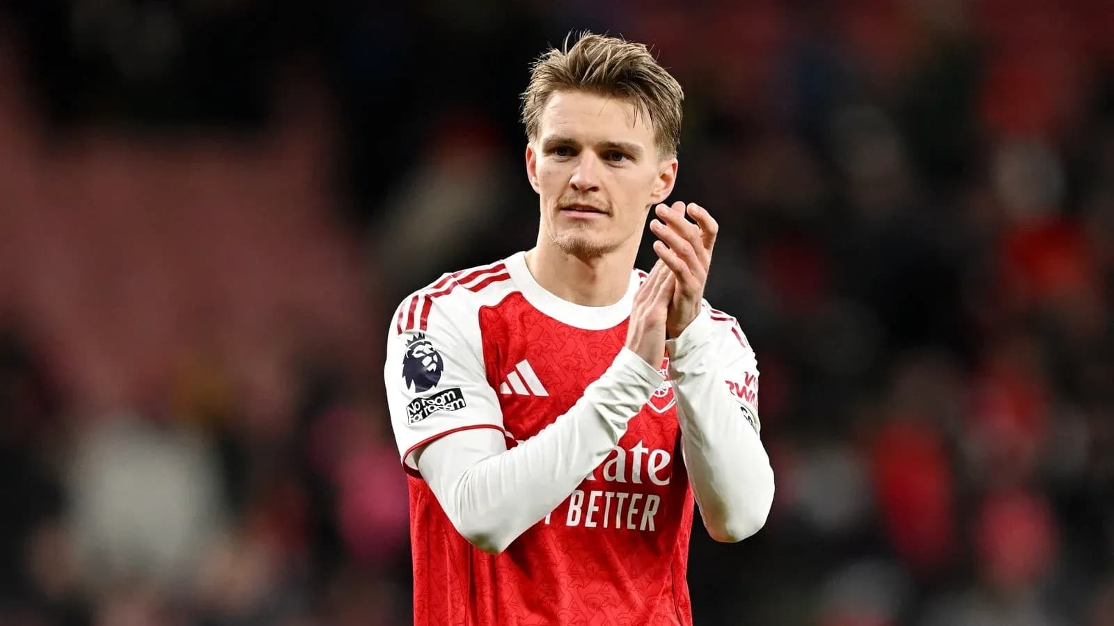 Player applauding fans after a match Player applauding fans after a match