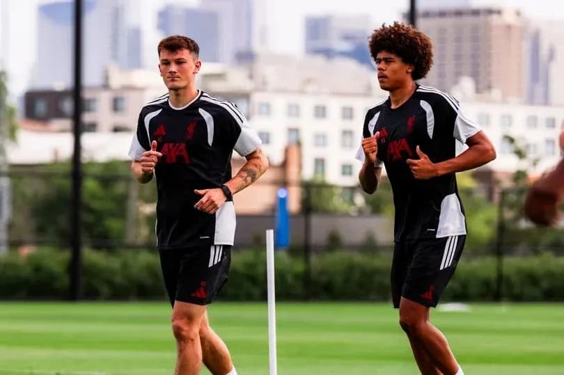 Two players jogging during training session Two players jogging during training session