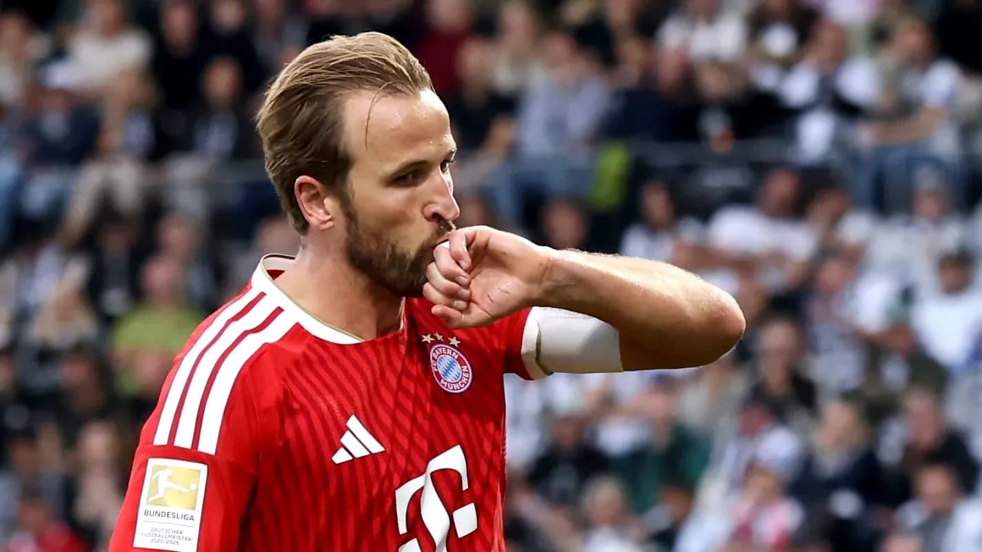 Player celebrating with hand kiss during match Player celebrating with hand kiss during match