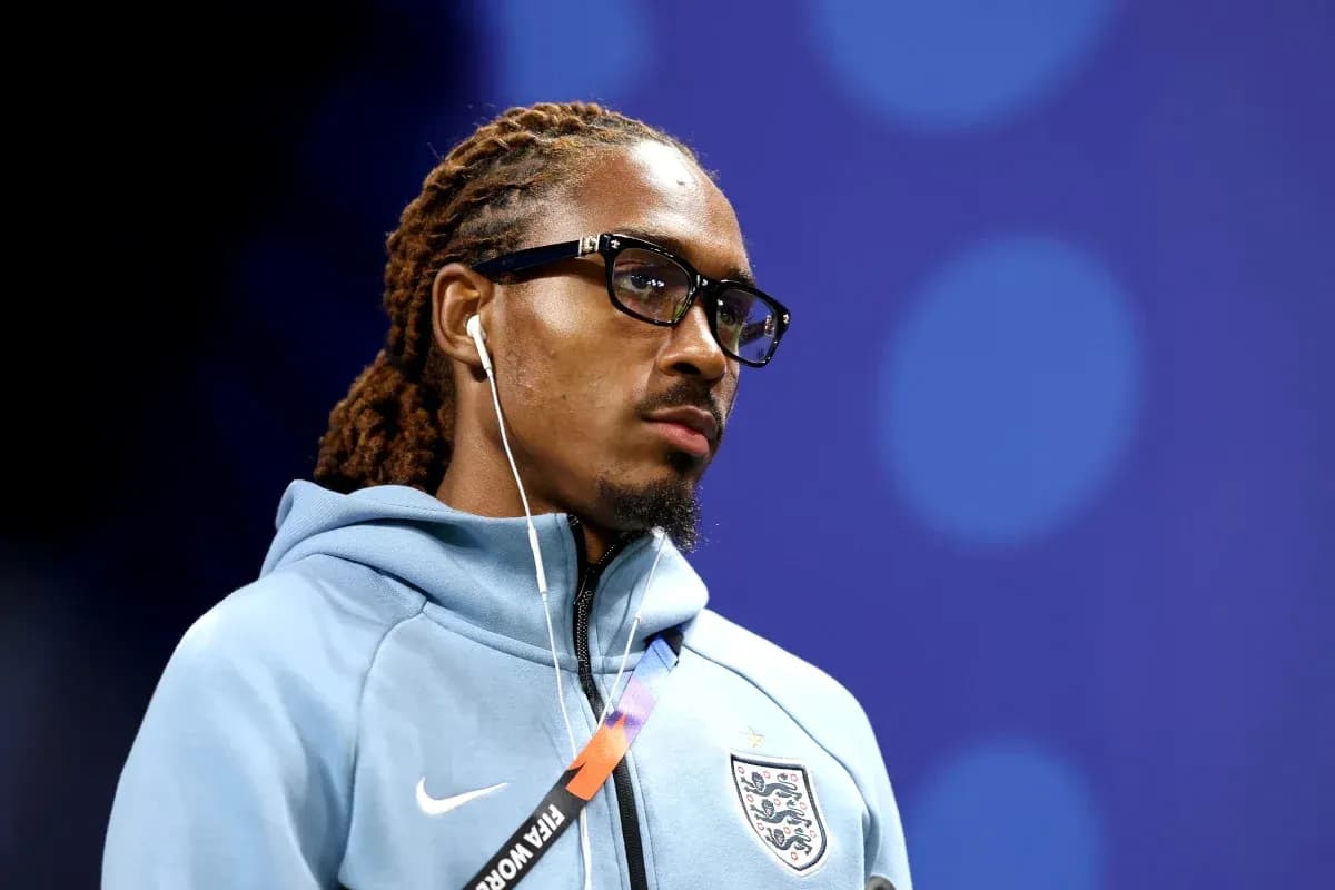 Player wearing glasses and headphones before match Player wearing glasses and headphones before match