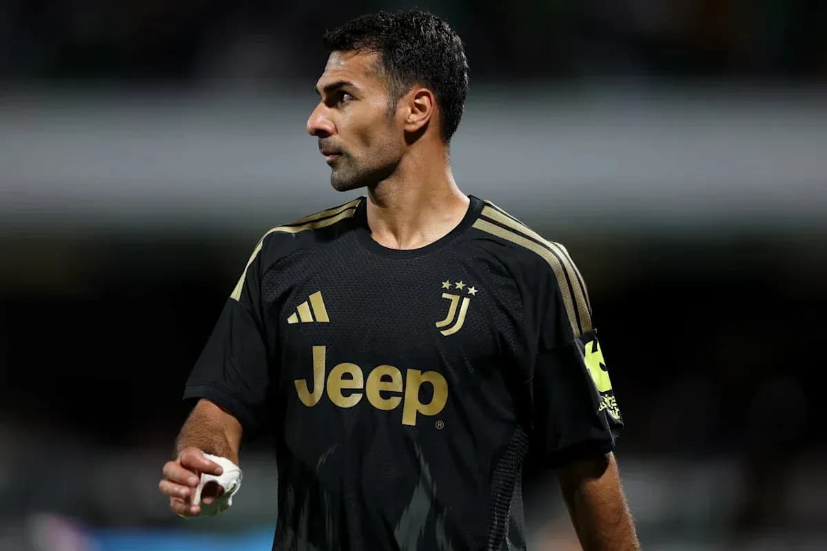 Juventus player in black jersey during match Juventus player in black jersey during match