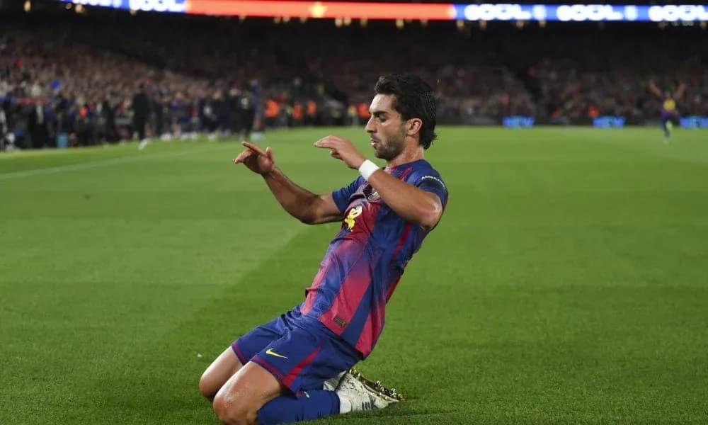 Player celebrating after scoring a goal for Barcelona Player celebrating after scoring a goal for Barcelona
